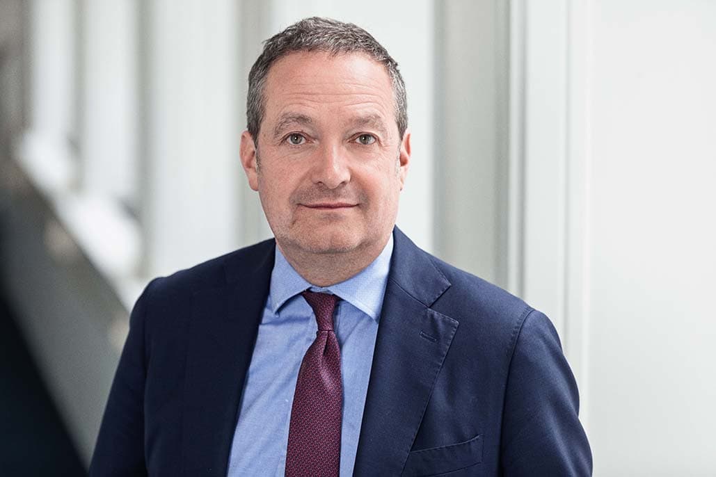 Chris Vogelzang, CEO of Danske Bank, in a suit and tie.