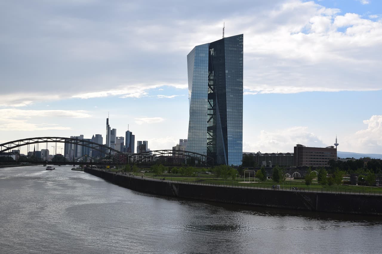 ECB building in Frankfurt with a river in the foreground.