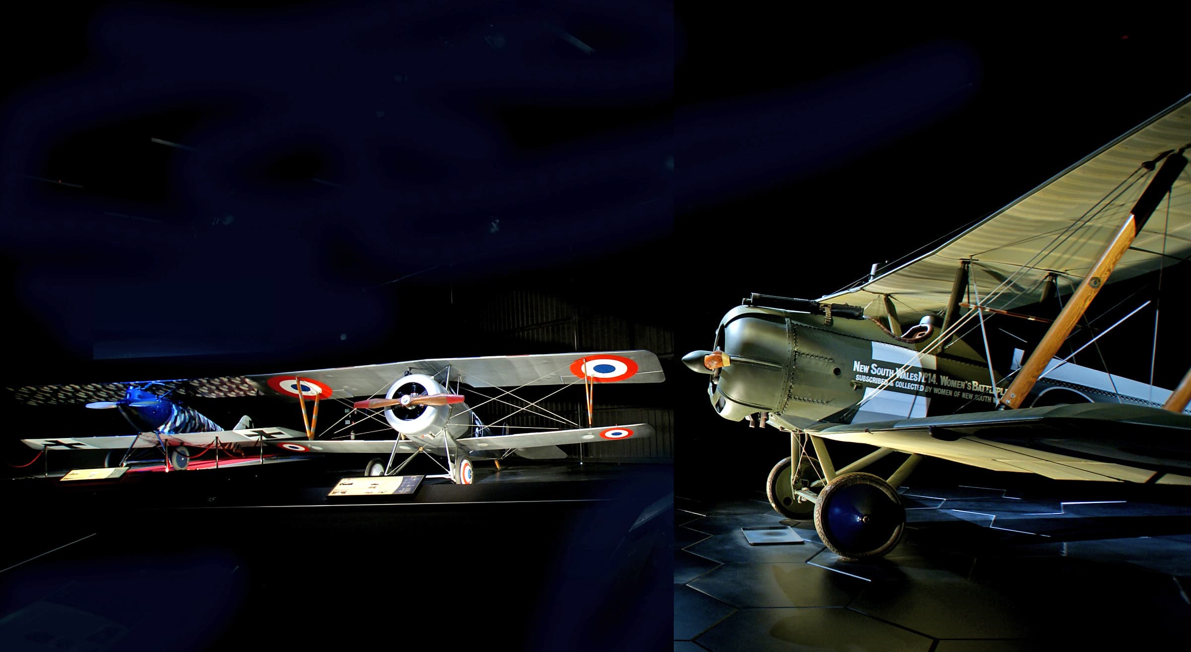 Vintage aircraft displayed in a museum setting.