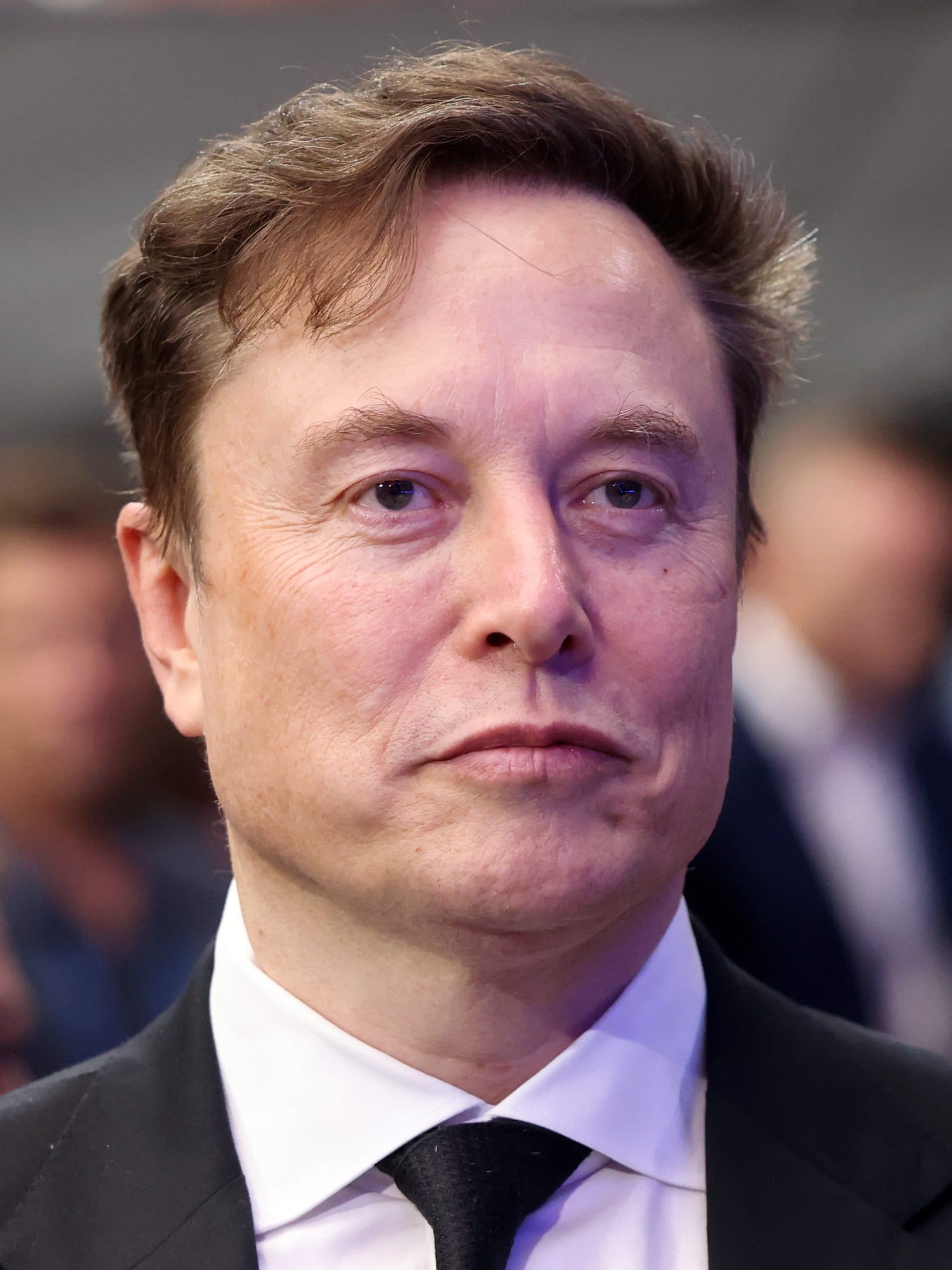 Elon Musk i närbild på en konferens.